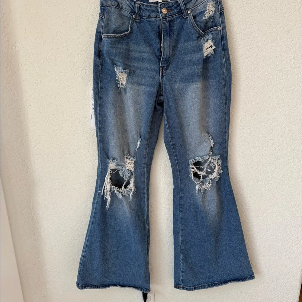 Almost Famous women's Light Blue Distressed flared Jeans